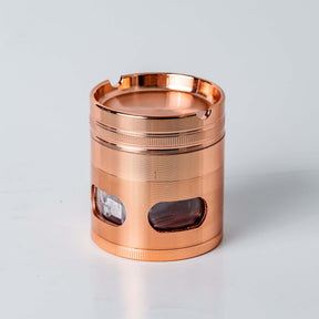Top Ashtray on 4-Piece Mirage Grinder in Rose Gold Color