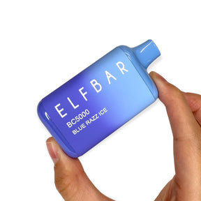 Holding Blue Razz Ice Elf Bar Flavor